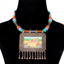 Silver pendant with Ganesha painting beaded with cotton thread